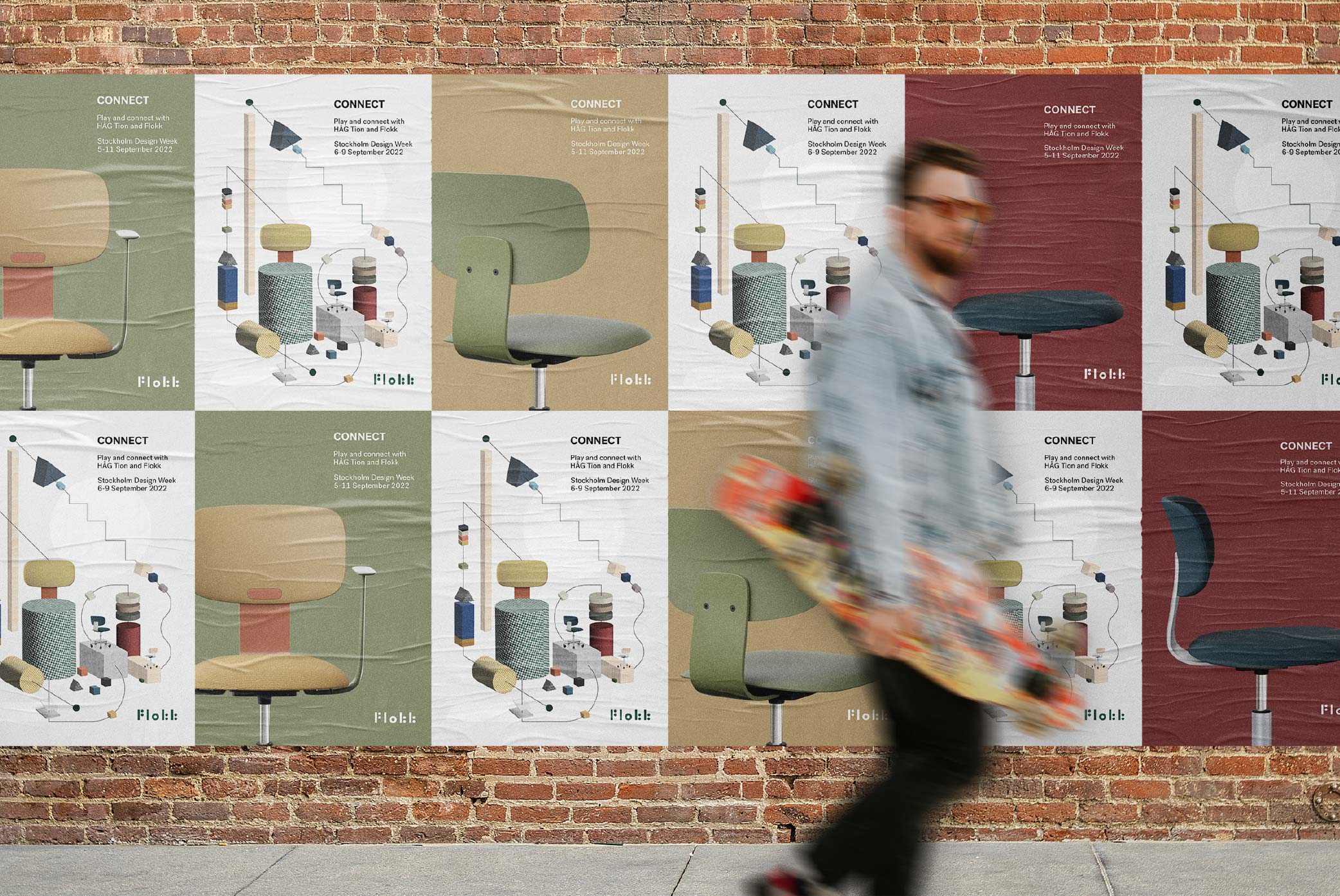 Man walks across many posters about Stockholm Design Week
