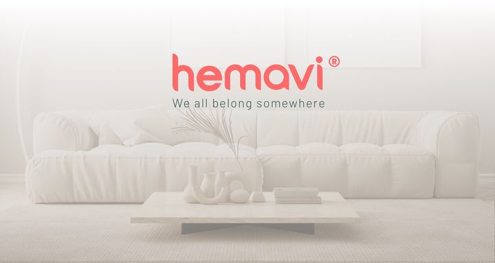 A picture of a white sofa with the Hemavi logo being shown as well.