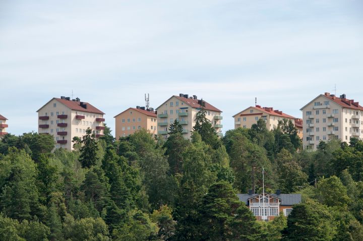 Photo showcasing Hägersten's landscape, with lots of trees and some homes seen in between