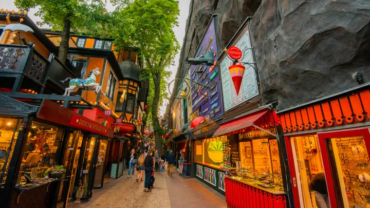 Copenhagen's city center, with a few tourists walking among shops