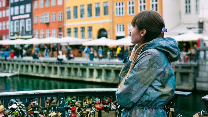 A young woman overlooking the view in Copenhagen, Denmark